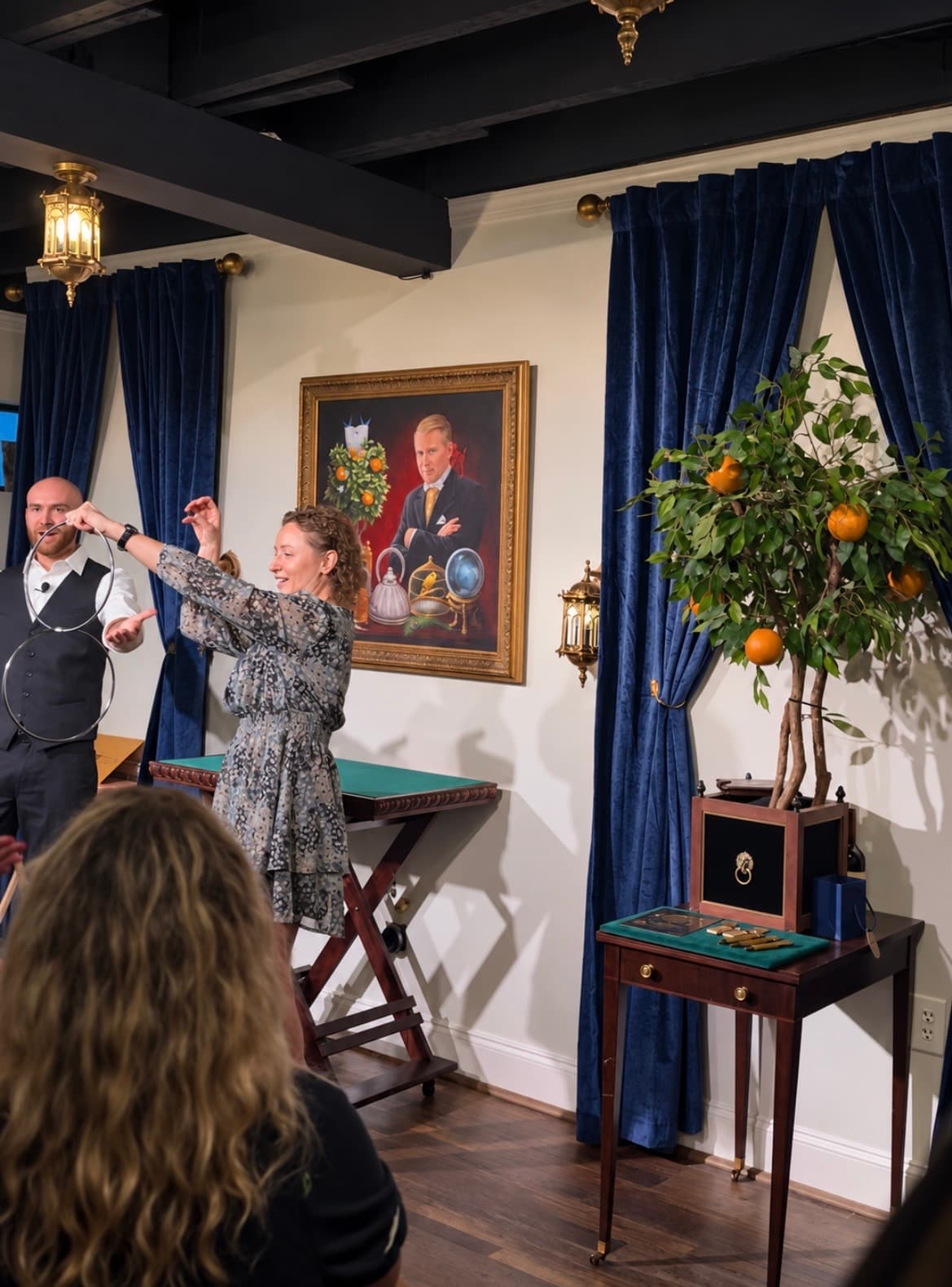 Dylan Looper performing a linking ring routine with a guest