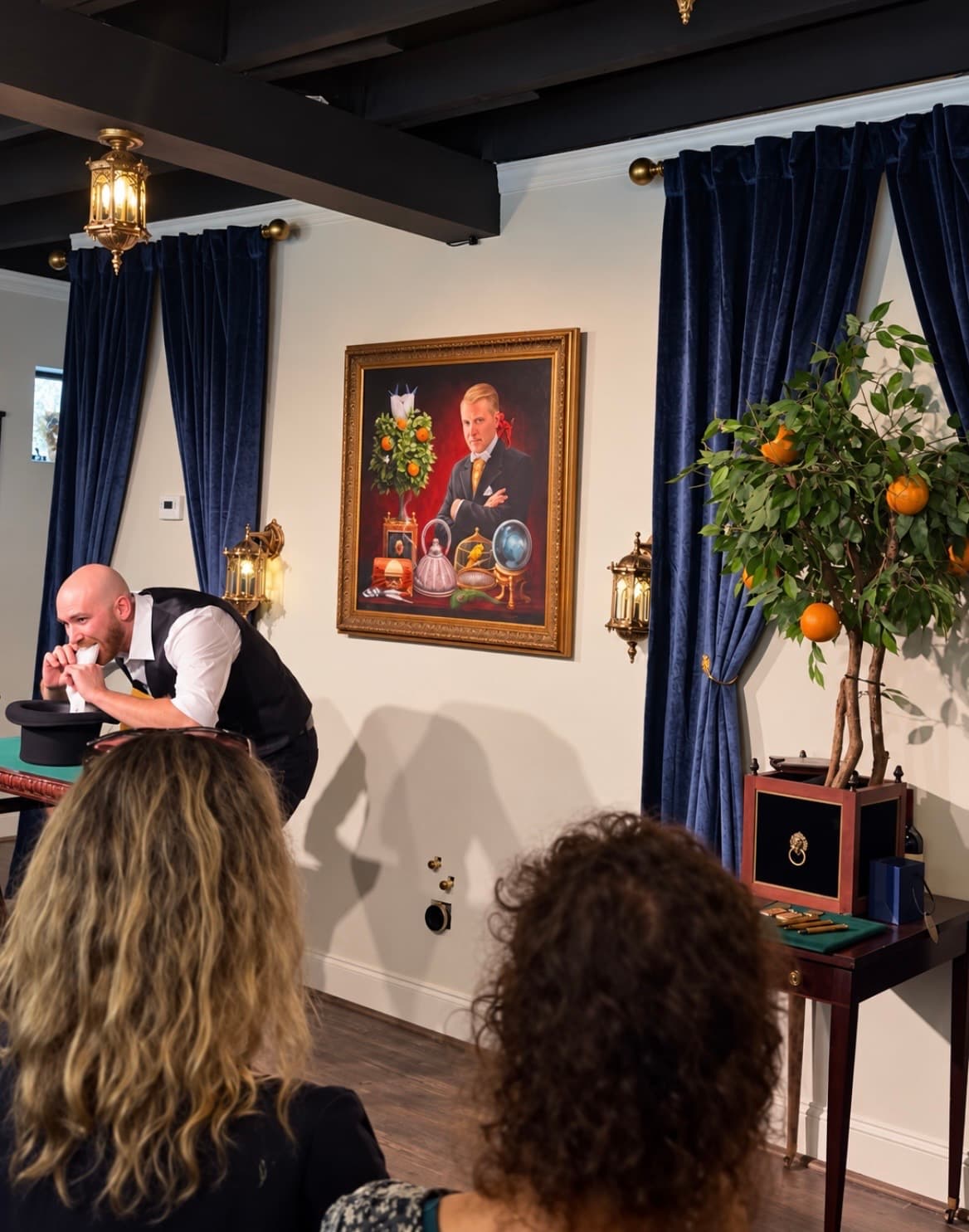 Dylan Looper performing a magic production for guests