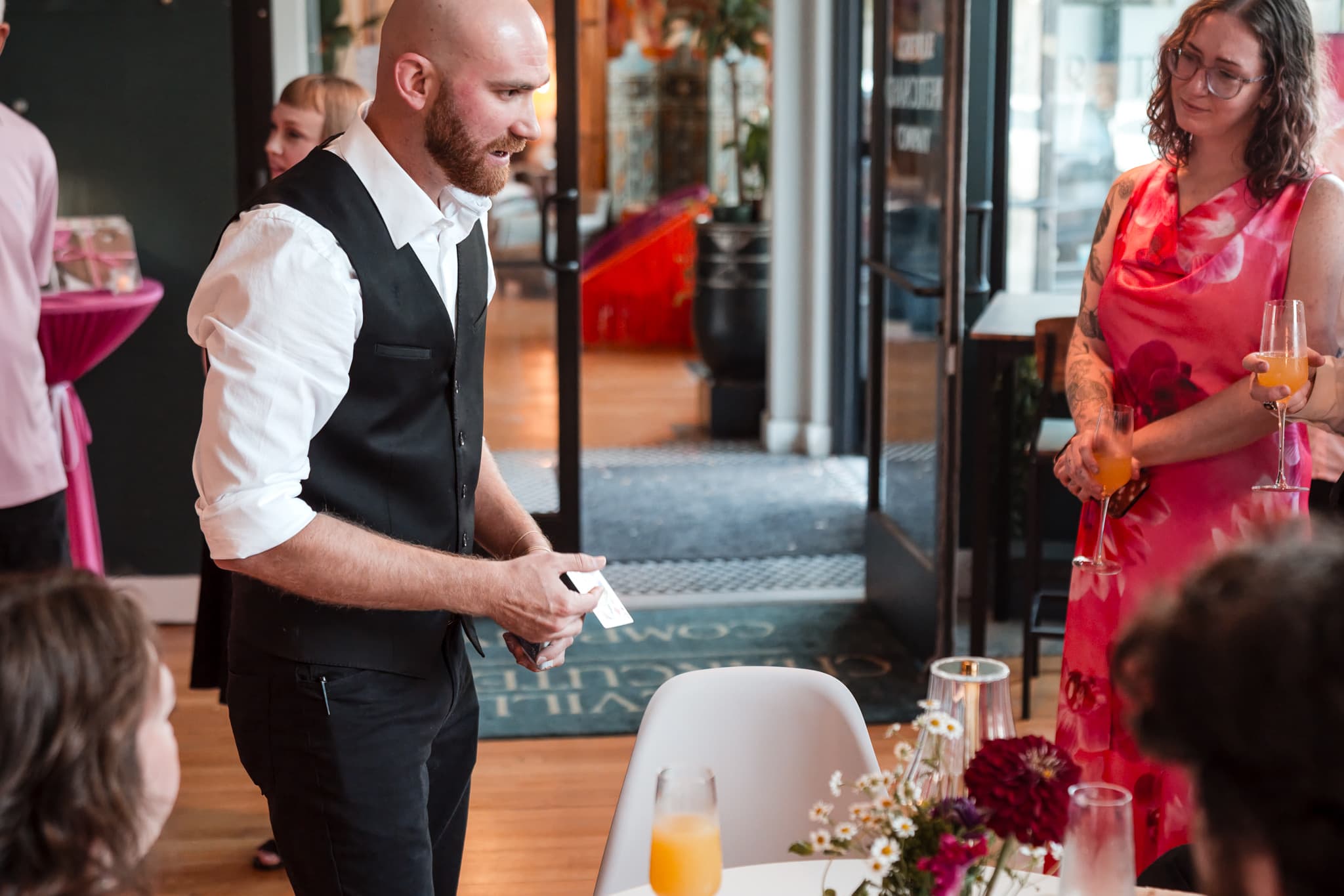 Dylan Looper performing close-up magic for guests
